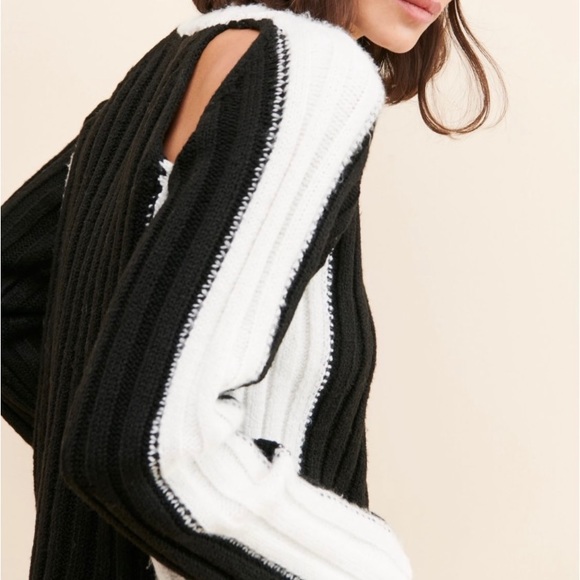 Black and white ribbed sweater with shoulder and back styled cutouts - Picture 2 of 3